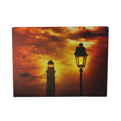 Northlight LED Lighted Lighthouse And Lantern Lamp Post With Amber Sky Canvas Wall Art 15.75" X 11.75" 1 Northlight LED Lighted Lighthouse And Lantern Lamp Post With Amber Sky Canvas Wall Art 15.75" X 11.75"