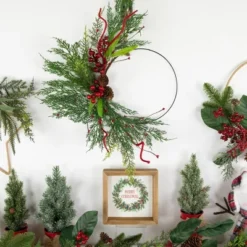 Northlight Real Touch™️ Mixed Greenery And Berries Artificial Christmas Wreath - 18" - Unlit